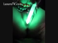 Horny honey masturbates with a glowing sextoy